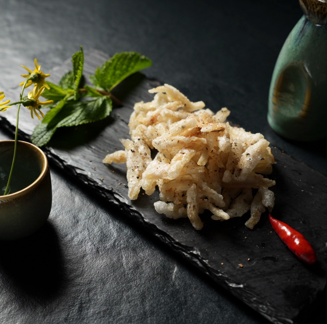 Frittierte Enoki-Pilze im Tempurateig bei Yakido Mundsburg