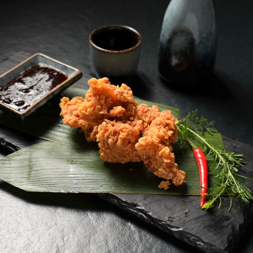 Korean Fried Chicken mit dunkler Sauce bei Yakido Mundsburg